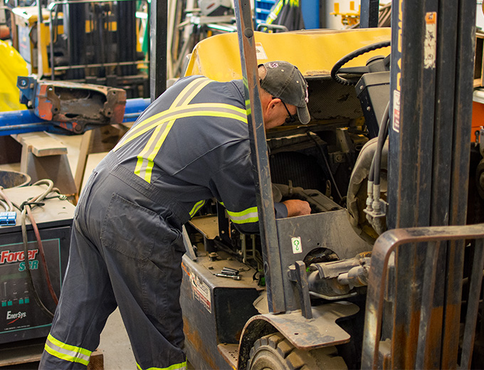 Allan fixing forklift